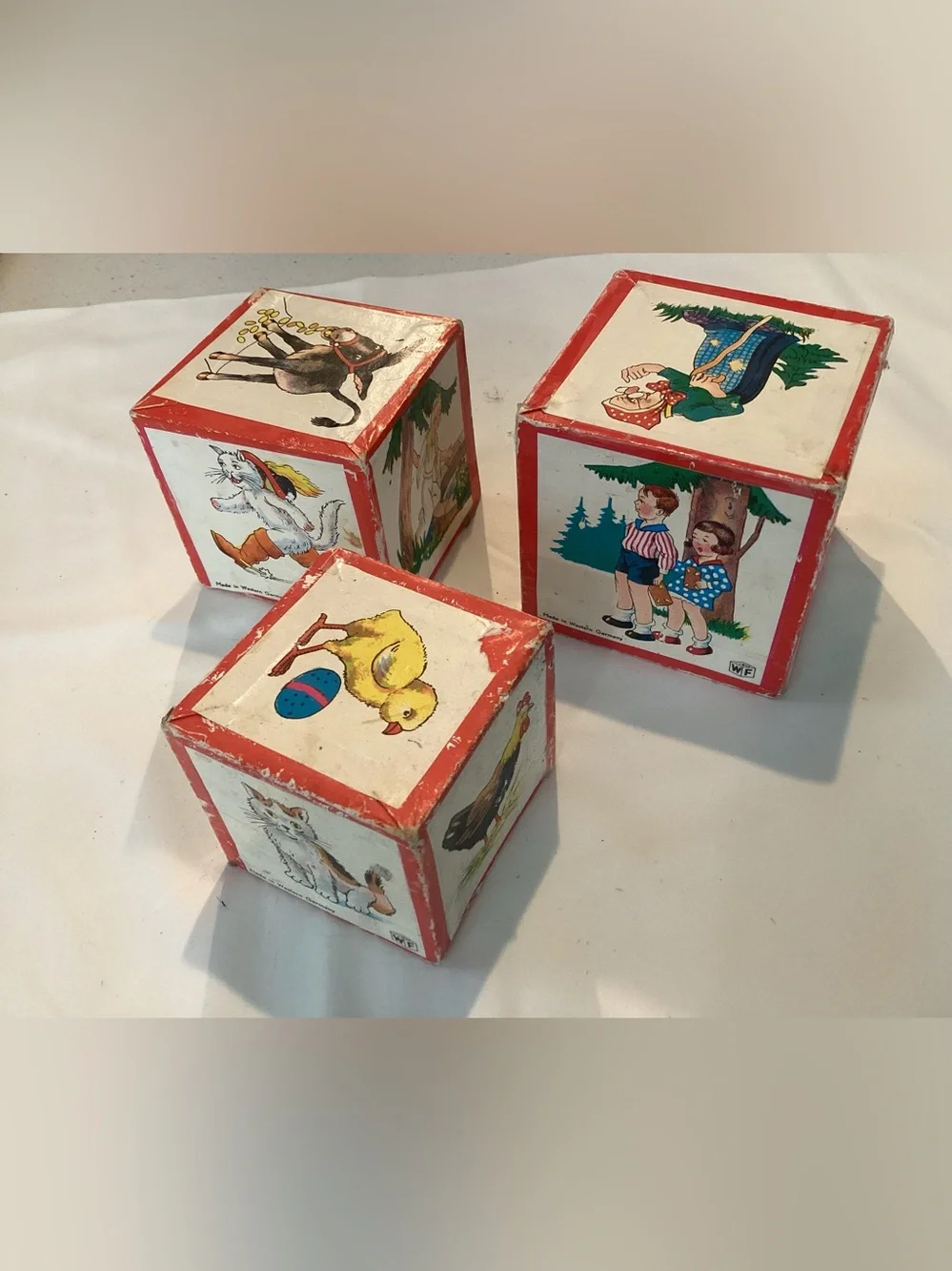 Vtg. West German made paper over wood nesting story book blocks. Vibrant Litho